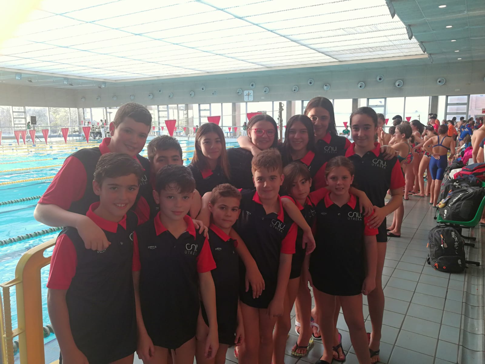 Grupo de nadadores participante cnu
